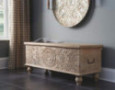 Signature Design by Ashley Fossile Ridge Boho Carved Wood Storage Bench with Hinge Top, Beige